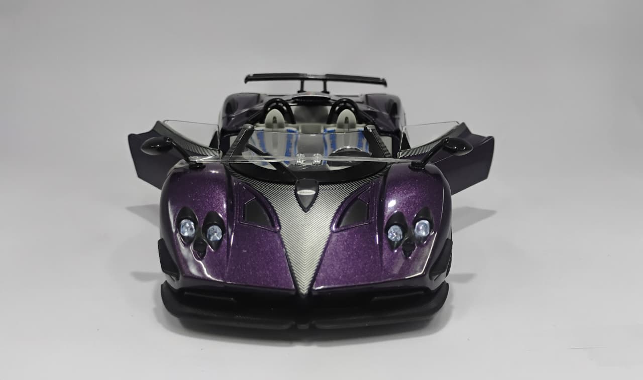 Pagani Zonda HP Barchetta in purple carbon fiber. 7 Pagani Zonda HP Barchetta Die-Cast Model in stunning metallic purple. - Image 1